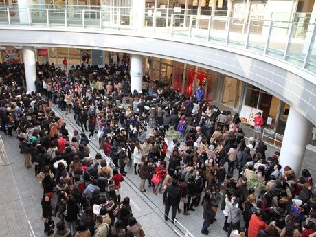 people waiting in front of mall for New Years sales in Japan